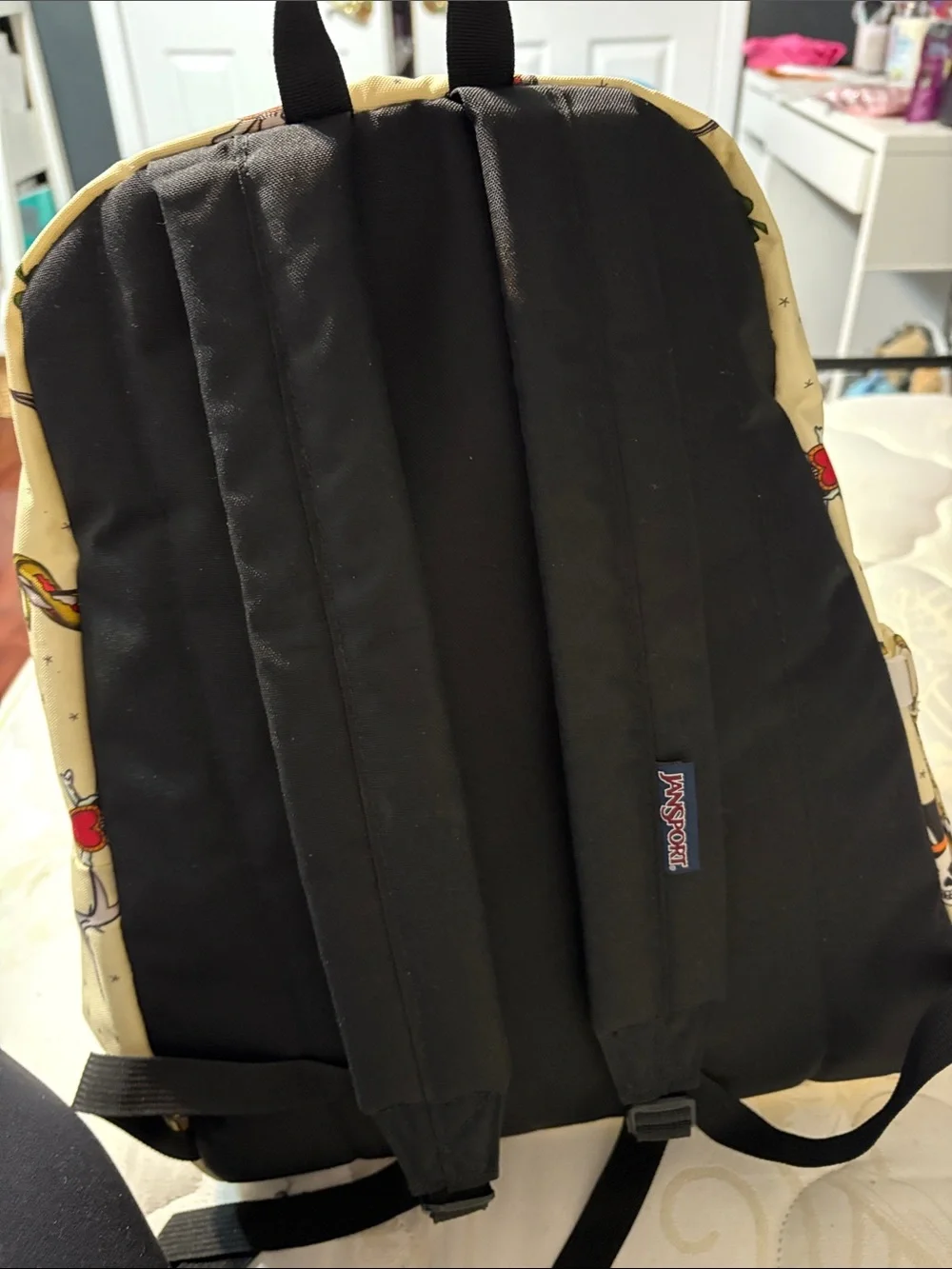 Jansport Cream Backpack with Tattoo-Style Prints